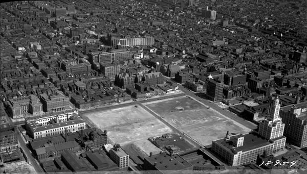 Aerial view of North Broad Street near Spring Garden showing cleared city blocks and the Philadelphia Inquirer building clock tower