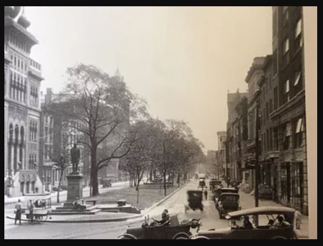 North Broad Street with Matthias Baldwin statue and Lu Lu Temple onion domes visible in the early twentieth century