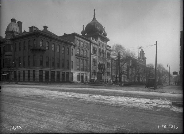 Broad and Spring Garden looking east in 1916, with LuLu Temple onion domes and a winter street